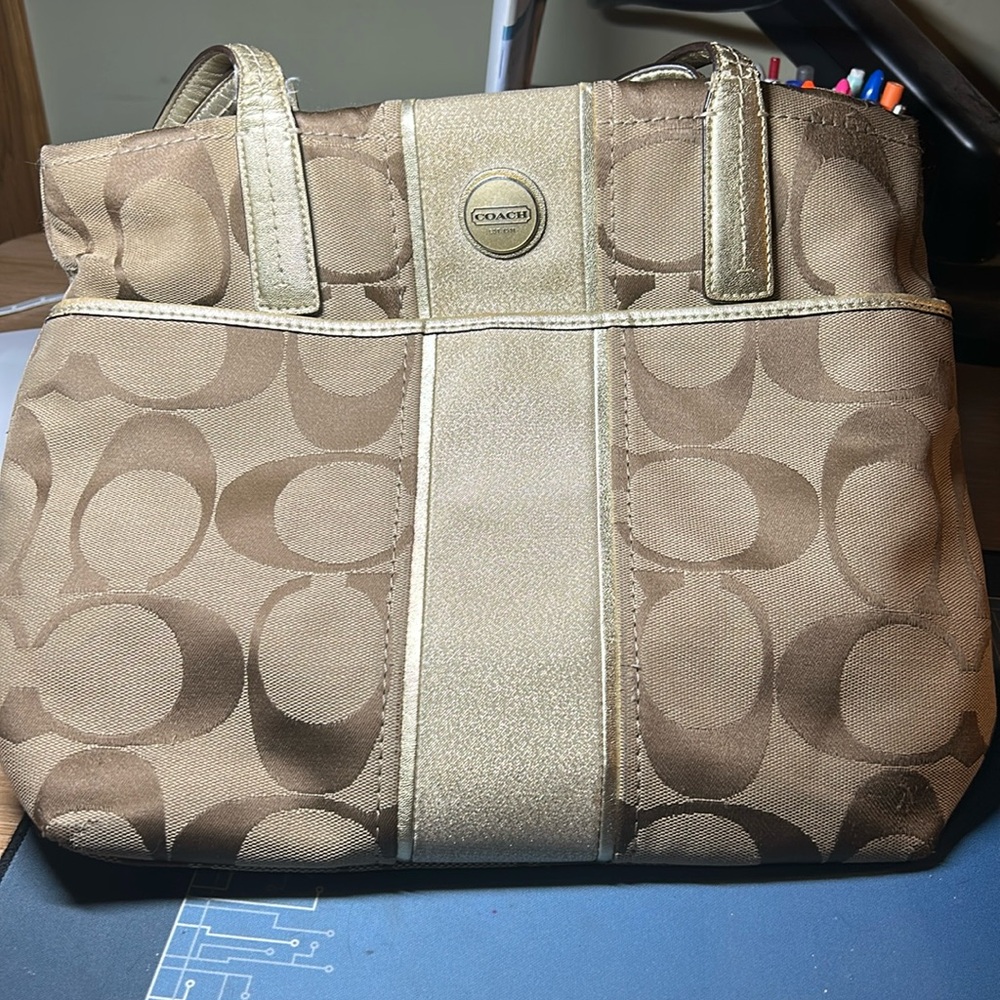 Adorable, gold and cream Coach as as quick